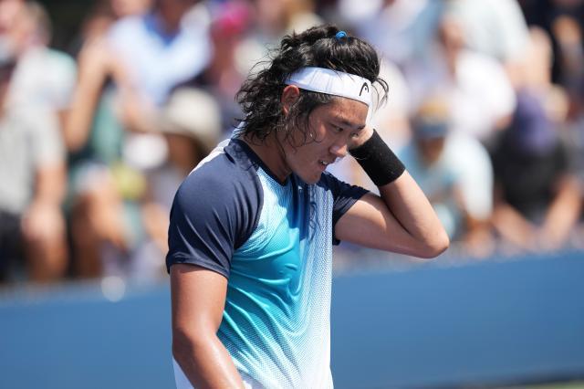 开云APP-张之臻丢赛点五盘告负 大满贯首胜这么近那么远？